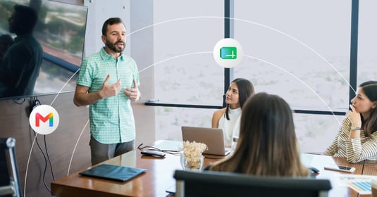 Coworkers listen to a presentation in a modern conference room 