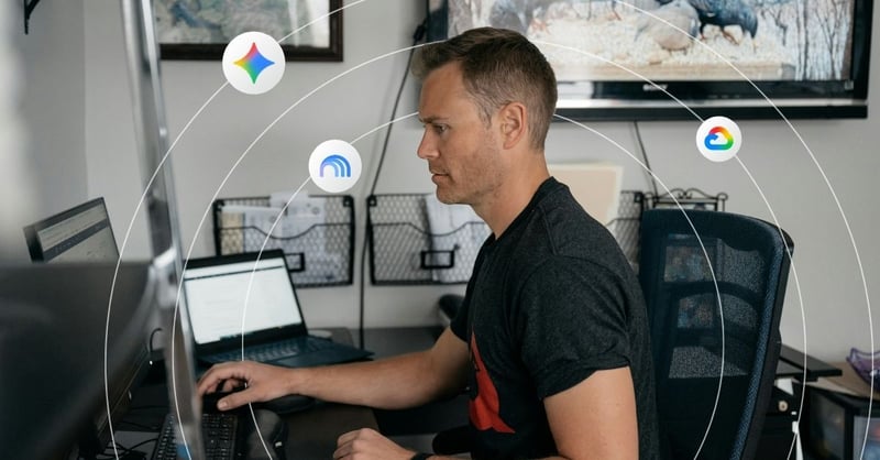 A man reviews data on his desktop computer