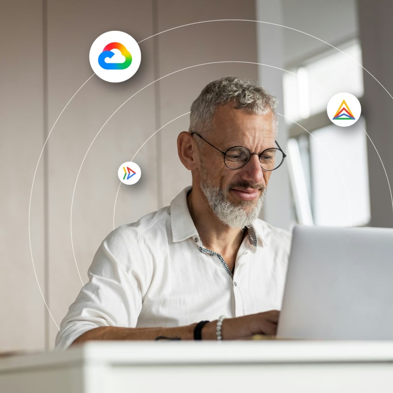 Man on a laptop learning about App Modernization.