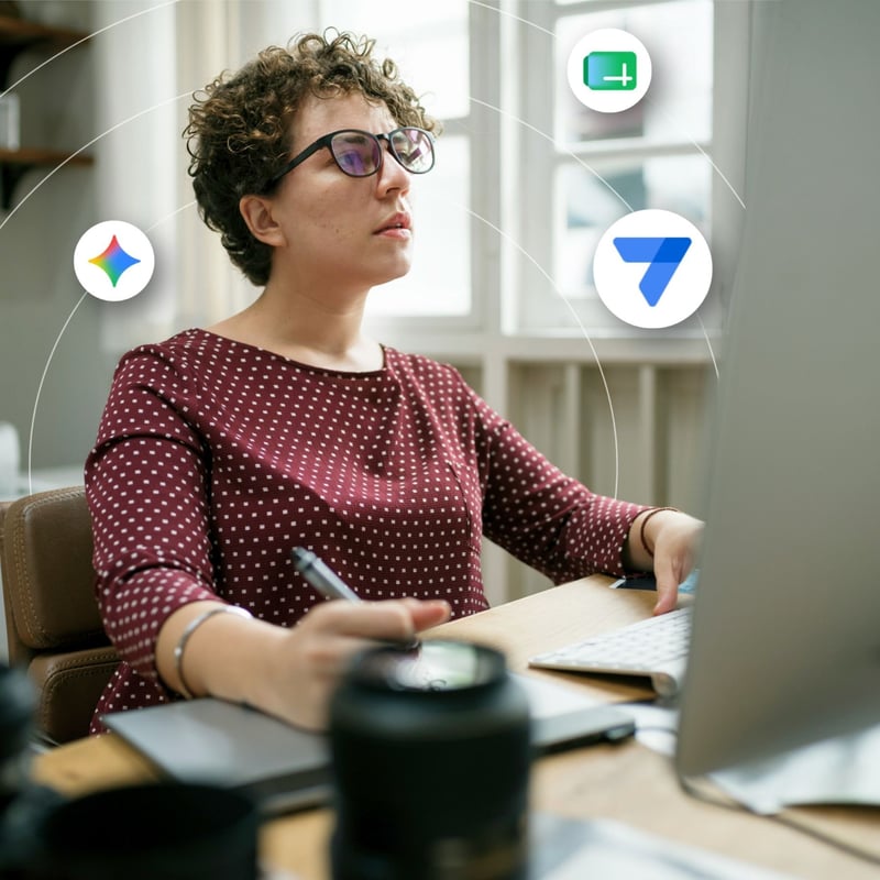 A woman looks quizzically at her computer screen