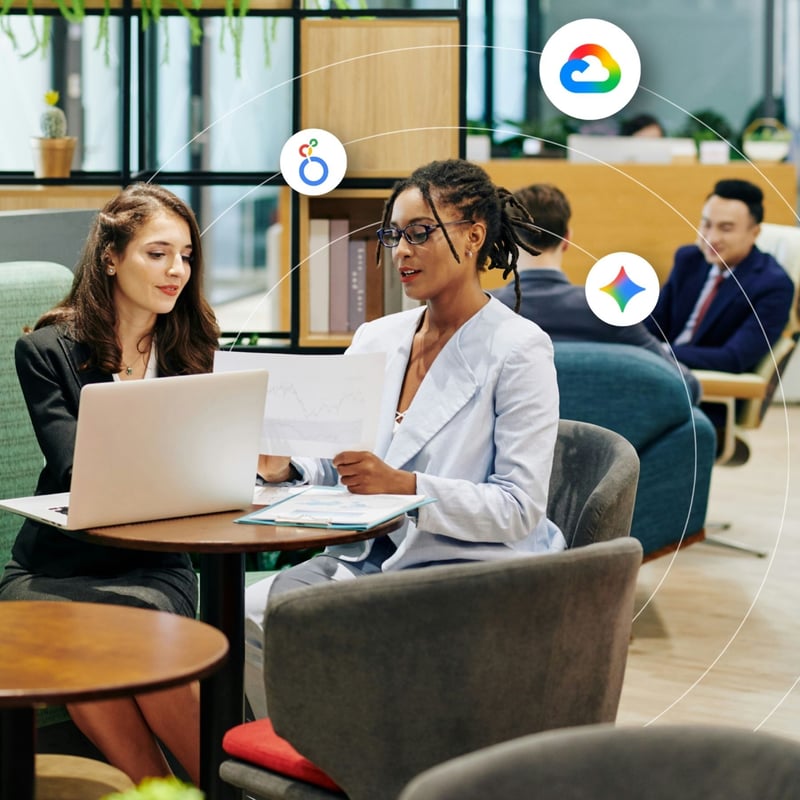People working on laptops together in a coworking environment