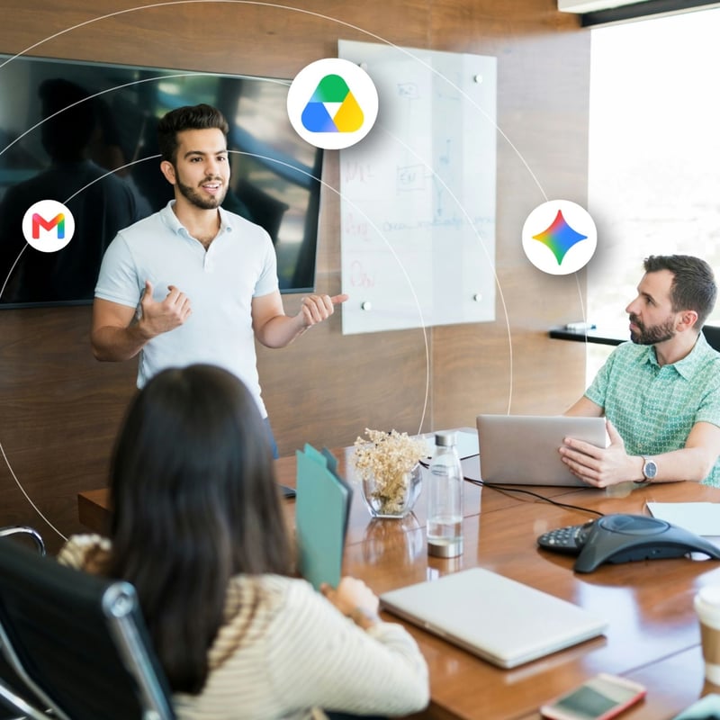 A man provides Google Workspace Training to a conference room of people