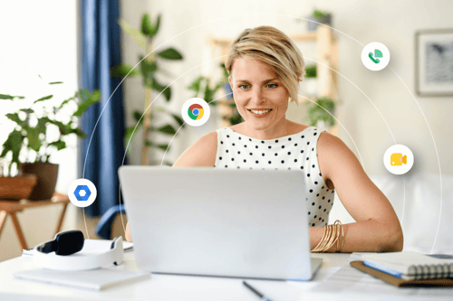 Blonde girl in a polka dot dress on her Chromebook.